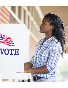 Young woman voting.